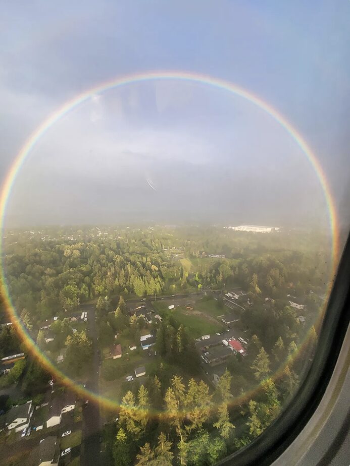 circular rainbow from plane window